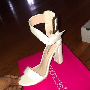 Cheetah and white heels